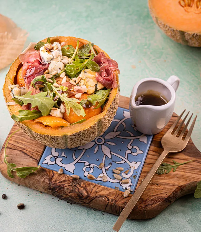 Rucolasalat mit Melone und Rohschinken
